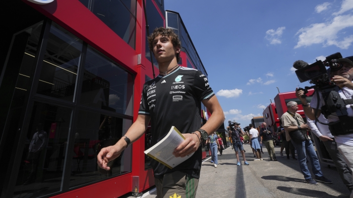 Mercedes driver Andrea Kimi Antonelli of Italy arrives in the paddock at the Enzo and Dino Ferrari racetrack, ahead the Italy's Emilia Romagna Formula One Grand Prix in Imola, Italy, Thursday, May 15, 2025. (AP Photo/Antonio Calanni)