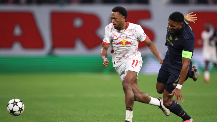 RB Leipzig's Belgian forward #11 Lois Openda fights for the ball with Juventus' Brazilian defender #03 Bremer (R) during the UEFA Champions League football match between RB Leipzig and Juventus FC at the Red Bull Arena in Leipzig on October 2, 2024. (Photo by Ronny HARTMANN / AFP)