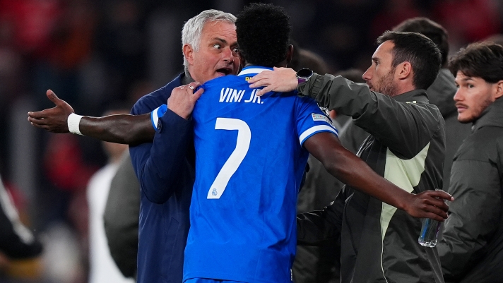  Jose Mourinho, Head Coach of Benfica, speaks to Vinicius Junior of Real Madrid during the UEFA Champions League 2025/26 League Knockout Play-off First Leg match between SL Benfica and Real Madrid C.F. at Estadio do SL Benfica on February 17, 2026 in Lisbon, Portugal. (Photo by Angel Martinez/Getty Images)