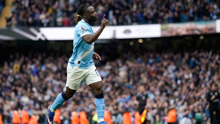 Manchester City's Jeremy Doku celebrates after scoring the opening goal during the English Premier League soccer match between Manchester City and Brentford in Manchester, Saturday, May 9, 2026. (AP Photo/Dave Thompson)