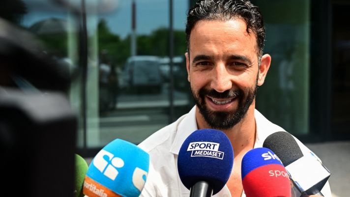 Italian football club AC Milan's newly recruited Portuguese coach Ruben Amorim talks to the press as he leaves Linate Airport after his arrivhal in Milan on July 6, 2026. (Photo by Piero CRUCIATTI / AFP)