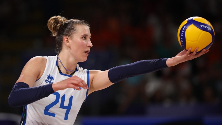  Ekaterina Antropova #24 of Team Italy prepares to serve during a Women's Preliminary Round match on day six of the Olympic Games Paris 2024 at Paris Arena on August 01, 2024 in Paris, France. (Photo by Jared C. Tilton/Getty Images)