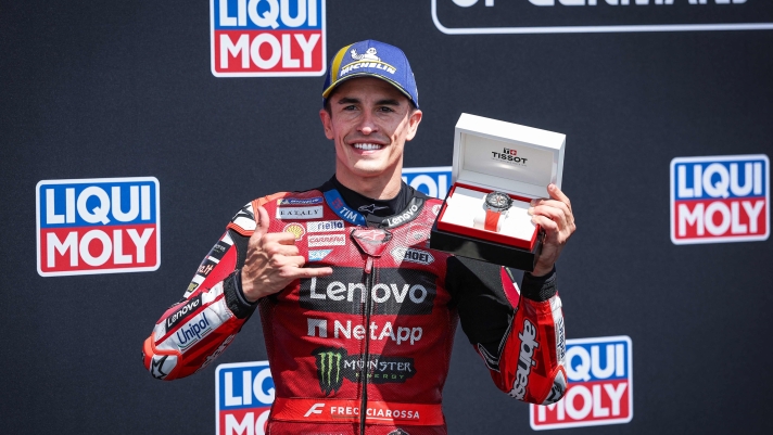 Ducati Lenovo Team's Spanish MotoGP rider Marc Marquez reacts after winning the qualifiying session of the German Motorcycle MotoGP Grand Prix at the Sachsenring race track in Hohenstein-Ernstthal near Chemnitz, eastern Germany, on July 11, 2026. (Photo by Ronny HARTMANN / AFP)