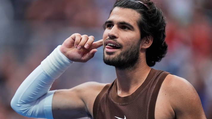 Carlos Alcaraz, of Spain, celebrates winning a match against Roman Safiullin, of Russia, during the first round of the U.S. Open tennis championships, Monday, Aug. 31, 2026, in New York. (AP Photo/Seth Wenig)