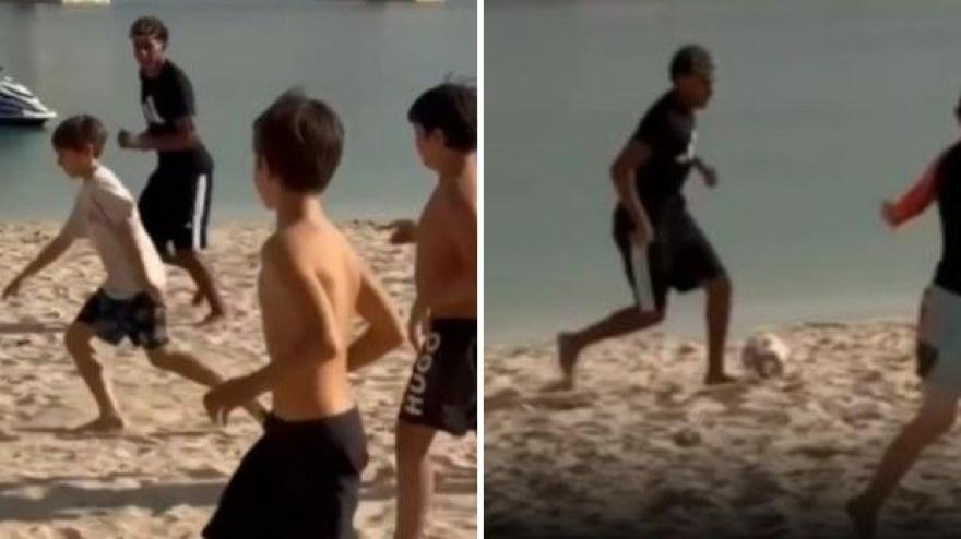 Lamine Yamal, show in spiaggia a Dubai: gioca a calcio con dei bambini