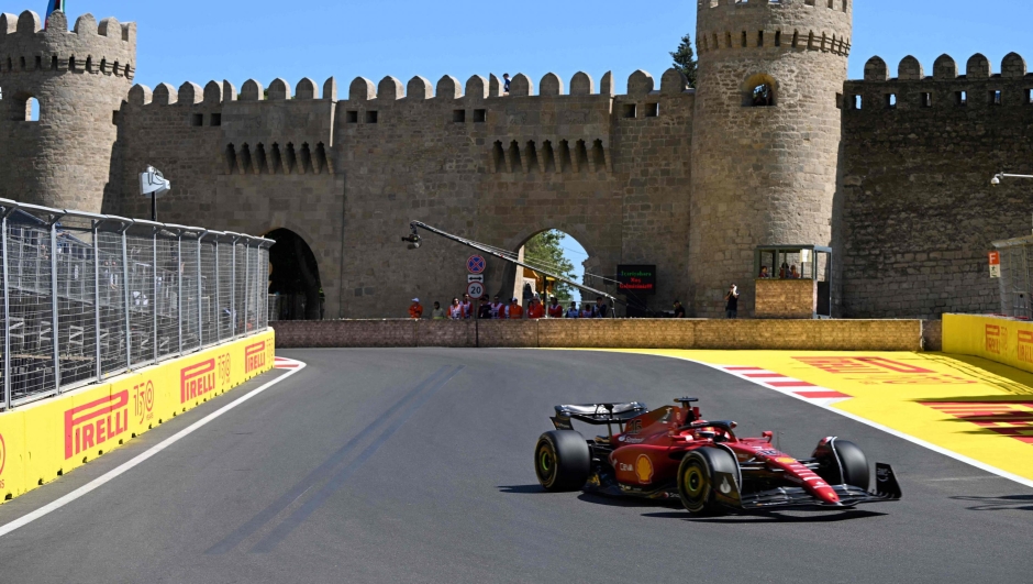 Ferrari's Monegasque driver Charles Leclerc steers his car during the first practice session ahead of the Formula One Azerbaijan Grand Prix at the Baku City Circuit in Baku on June 10, 2022. (Photo by OZAN KOSE / AFP)