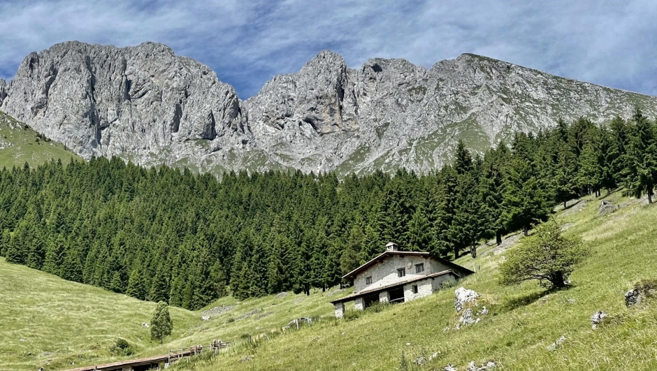 Majestic peaks and green meadows characteristic of the Presolana Pass in Val Seriana.