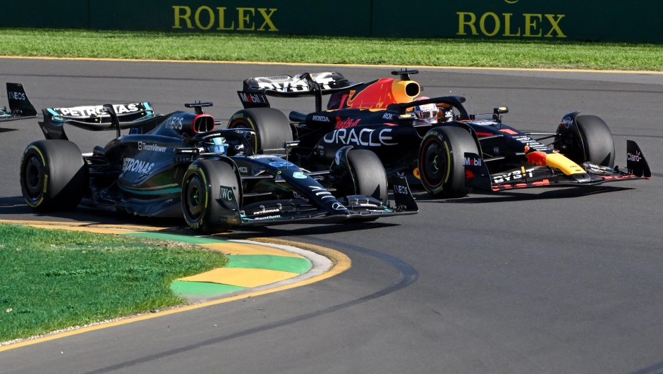 Mercedes' British driver George Russell leads Red Bull Racing's Dutch driver Max Verstappen during the 2023 Formula One Australian Grand Prix at the Albert Park Circuit in Melbourne on April 2, 2023. (Photo by WILLIAM WEST / AFP) / -- IMAGE RESTRICTED TO EDITORIAL USE - STRICTLY NO COMMERCIAL USE --