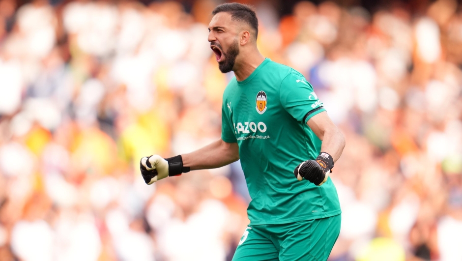VALENCIA, SPAIN - MAY 21: Giorgi Mamardashvili of Valencia CF celebrates after Diego Lopez (not pictured) scores the team's second goal during the LaLiga Santander match between Valencia CF and Real Madrid CF at Estadio Mestalla on May 21, 2023 in Valencia, Spain. (Photo by Aitor Alcalde/Getty Images)