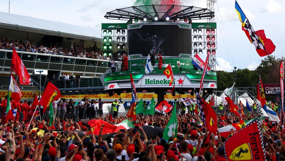 MONZA, ITALY - SEPTEMBER 08: A general view as race winner Charles Leclerc of Monaco and Ferrari celebrates on the podium with second placed Valtteri Bottas of Finland and Mercedes GP and third place Lewis Hamilton of Great Britain and Mercedes GP during the F1 Grand Prix of Italy at Autodromo di Monza on September 08, 2019 in Monza, Italy. (Photo by Dan Istitene/Getty Images)