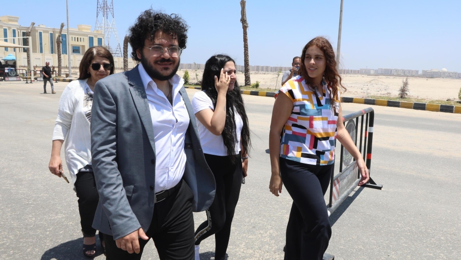 epa10757290 Egyptian researcher Patrick Zaki (L) is welcomed outside the Dakahlia security building in Mansoura, north of Cairo, Egypt, 20 July 2023. According to Egyptian state media, Egyptian researcher Patrick Georges Zaki, lawyer Mohammed al-Baqer and other unnamed prisoners have been pardoned by President Abdel Fattah al-Sisi on 19 July. Zaki, was a university student working on a masters degree in Italy who was arrested when he returned to Egypt for a family visit and sentenced to three years in prison. Al-Baqer had been the lawyer of another jailed activist British Egyptian Alaa Abdel Fattah and was arrested in 2019. Both al-Baqer and Zaki were condemned to time in prison mainly for 'spreading false news' among other charges.  EPA/KHALED ELFIQI