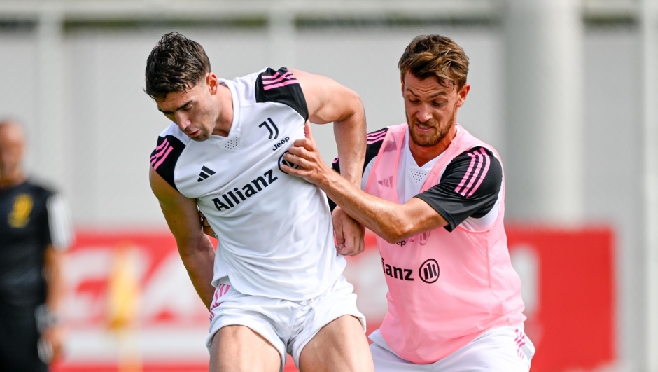 TURIN, ITALY - JULY 13: Dusan Vlahovic, Daniele Rugani of Juventus during a training session at JTC on July 13, 2023 in Turin, Italy. (Photo by Daniele Badolato - Juventus FC/Juventus FC via Getty Images)