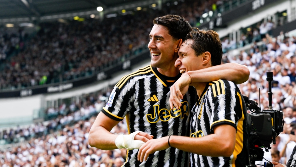 TURIN, ITALY - SEPTEMBER 16: Federico Chiesa of Juventus celebrates after scoring his team's second goal with teammate Dusan Vlahovic during the Serie A TIM match between Juventus and SS Lazio at Allianz Stadium on September 16, 2023 in Turin, Italy. (Photo by Daniele Badolato - Juventus FC/Juventus FC via Getty Images)