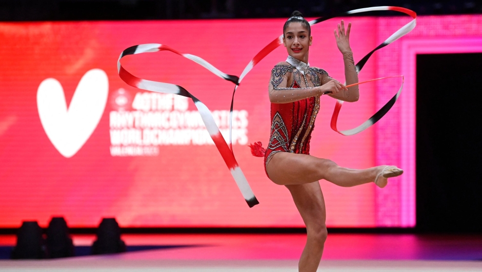 Italy's Sofia Raffaeli competes in the 40th FIG Rhythmic Gymnastics World Championships individual ribbons final in Valencia on August 24, 2023. The 40th FIG Rhythmic Gymnastics World Championships, which qualify for the Paris 2024 Olympic Games, run from August 23 to 27. (Photo by JOSE JORDAN / AFP)