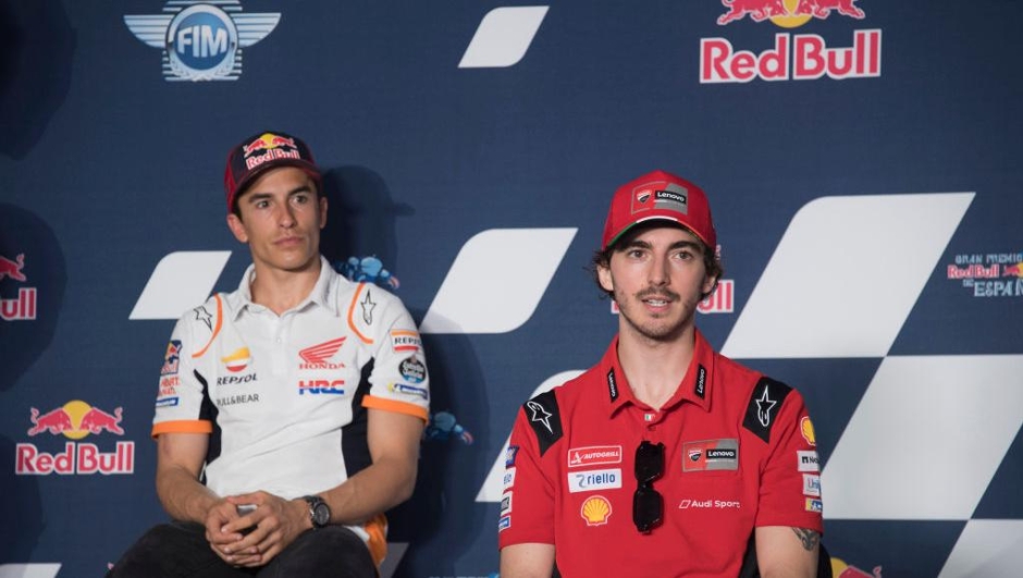 JEREZ DE LA FRONTERA, SPAIN - APRIL 29: Francesco Bagnaia of Italy and Ducati Lenovo Team (R) speaks and Marc Marquez of Spain and Repsol Honda Team looks on during the press conference pre-event during the MotoGP of Spain - Previews at Circuito de Jerez on April 29, 2021 in Jerez de la Frontera, Spain. (Photo by Mirco Lazzari gp/Getty Images)