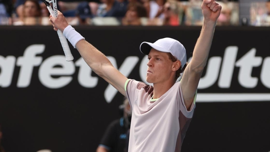 MELBOURNE, AUSTRALIA - JANUARY 26: Jannik Sinner of Italy celebrates match point in their Semifinal singles match against Novak Djokovic of Serbia during the 2024 Australian Open at Melbourne Park on January 26, 2024 in Melbourne, Australia. (Photo by Julian Finney/Getty Images)