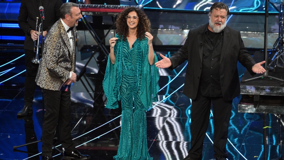 Sanremo Festival host and artistic director Amadeus (L) with Sanremo Festival co-host and Italian actress Teresa Mannino (C) and Australian actor Russell Crowe (R) on stage at the Ariston theatre during the 74th Sanremo Italian Song Festival, Sanremo, Italy, 08 February 2024. The music festival will run from 06 to 10 February 2024.  ANSA/ETTORE FERRARI