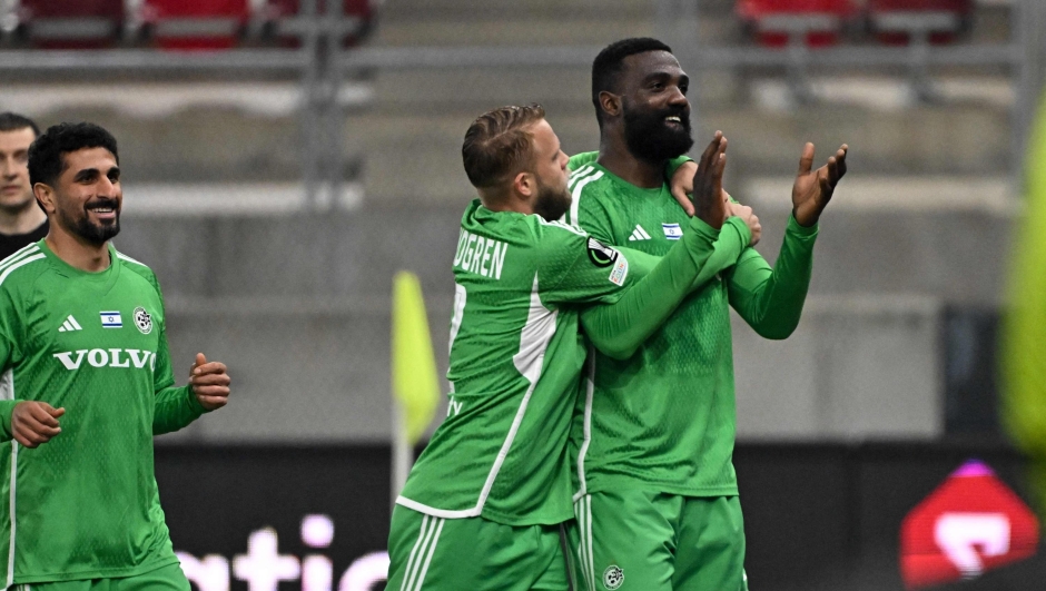 Maccabi Haifa's Haitian foward #09 Frantzdy Pierrot celebrates scoring during the UEFA Europa Conference League last 32 first leg football match between Maccabi Haifa and Gent in Budapest, on February 15, 2024. (Photo by ATTILA KISBENEDEK / AFP)