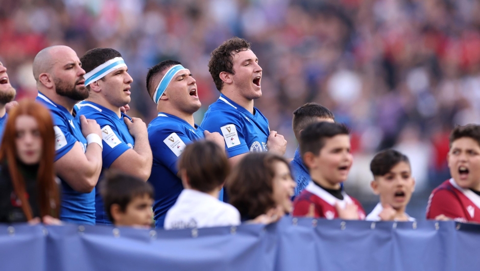 ROME, ITALY - MARCH 11: Michele Lamaro of Italy sings the National Anthems with teammates prior to the Six Nations Rugby match between Italy and Wales at Stadio Olimpico on March 11, 2023 in Rome, Italy. (Photo by Warren Little/Getty Images)