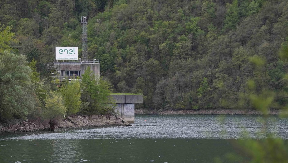 FILE - A view of the Enel Green Power hydroelectric plant at the Suviana Dam, some 70 kilometers southwest of Bologna, Italy, April 10, 2024. Divers have discovered two more bodies of workers who died in an explosion that collapsed and flooded several levels of an underground hydroelectric plant earlier this week, bringing to five the number of confirmed dead, officials said Thursday. (AP Photo/Antonio Calanni, File)