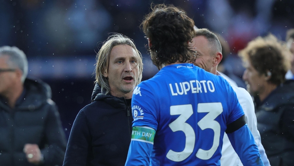 EMPOLI, ITALY - APRIL 20: Davide Nicola head coach of Empoli FC and Sebastiano Luperto of Empoli FC celebrates the victory after the Serie A TIM match between Empoli FC and SSC Napoli at Stadio Carlo Castellani on April 20, 2024 in Empoli, Italy.(Photo by Gabriele Maltinti/Getty Images)