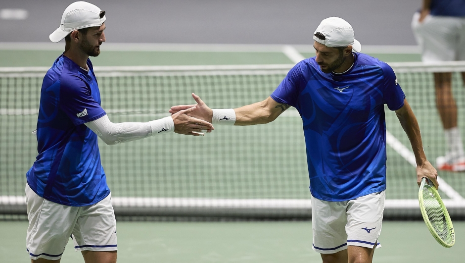 BOLOGNA, ITALY - SEPTEMBER 11: Andrea Vavassori and Simone Bolelli of Italy during the 2024 Davis Cup Finals Group Stage Bologna match between the Italy and Brazil at Unipol Arena on September 11, 2024 in Bologna, Italy. (Photo by Emmanuele Ciancaglini/Getty Images for ITF)