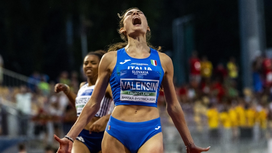 BANSKA BYSTRICA, SLOVAKIA - JULY 20: Elisa Valensin of Italy competes in Women's 200m during day three of the European Athletics U18 Championships 2024 at Stiavnicky - Stadion SNP on July 20, 2024 in Banska Bystrica, Slovakia.  (Photo by Jurij Kodrun/Getty Images for European Athletics)