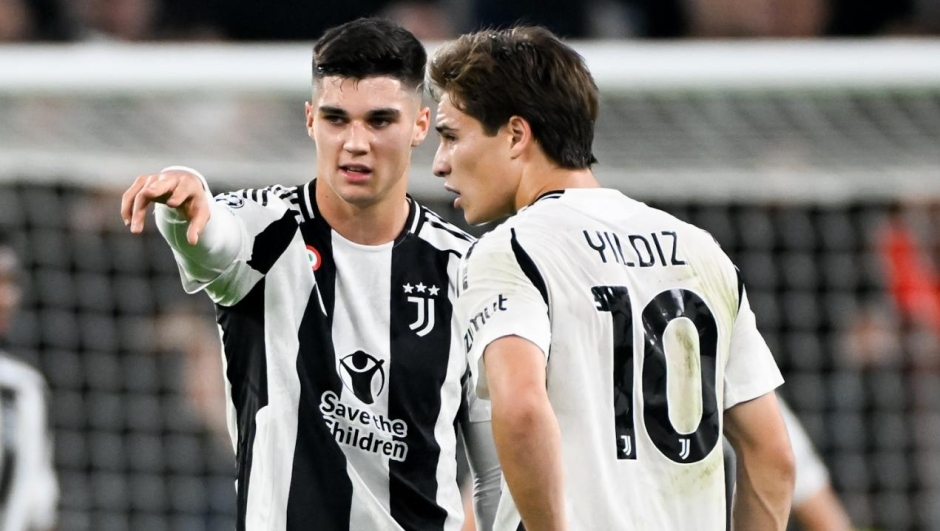Vasilije Adzic of Juventus speaks with his teammate Kenan Yildiz during the UEFA Champions League 2024/25 League Phase MD3 match between Juventus and VfB Stuttgart at Juventus Stadium on October 22, 2024 in Turin, Italy. (Photo by Daniele Badolato - Juventus FC/Juventus FC via Getty Images)