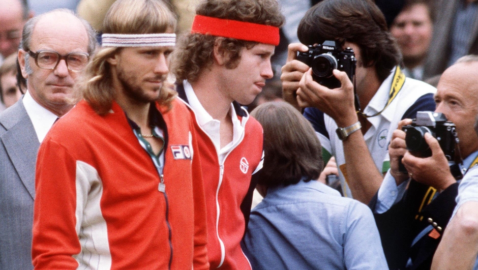 FILE- photo dated July 1980 showing tennis stars Bjorn Borg, left, and John McEnroe after the 1980 Men's Singles Final at Wimbledon. Britain's Duke of York Sunday July 2 2000, has planned to recreate the classic Wimbledon final between Borg and McEnroe on the Buckingham Palace tennis court, in London, which will take place later today. (AP Photos / PA) **UK OUT, MAGS OUT , NO SALES**