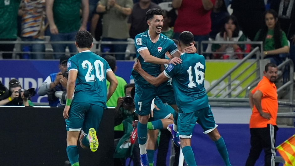 Iraq's players celebrate after their teammate Ali Al-Hamadi scored during the World Cup playoff final soccer match between Iraq and Bolivia in Monterrey, Mexico, Tuesday, March 31, 2026. (AP Photo/Fernando Llano)