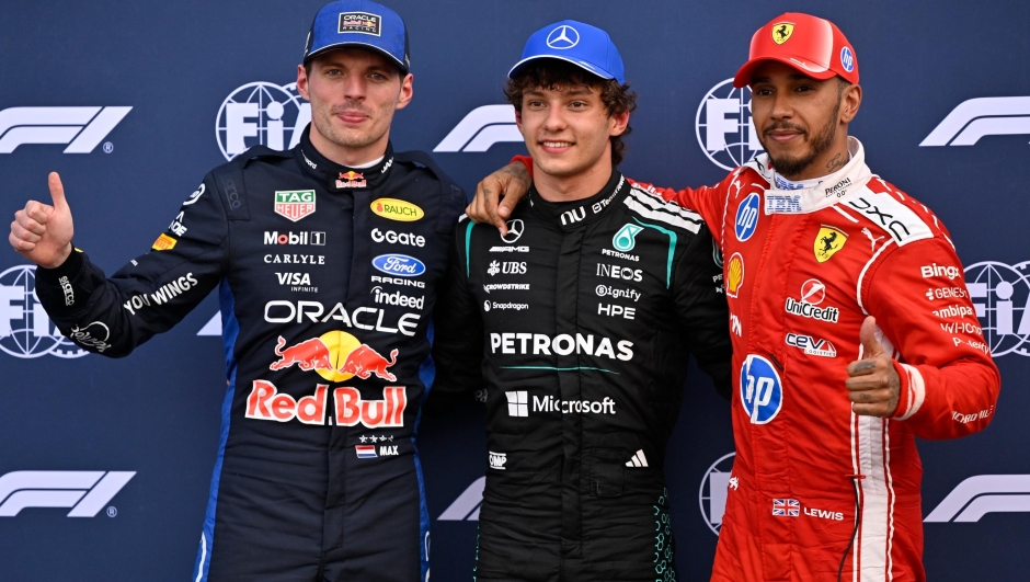 Pole position Mercedes driver Andrea Kimi Antonelli of Italy, center, is flanked by second fastest time Red Bull driver Max Verstappen of the Netherlands and third fastest time Ferrari driver Lewis Hamilton of Britain after the qualifying session for the Monaco F1 Grand Prix, at the Monaco racetrack, Saturday, June 6, 2026. (AP Photo/Philippe Magoni)