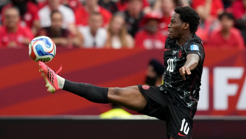 Canada's Jonathan David (10) gets his boot on the ball during the World Cup Group B soccer match between Canada and Qatar in Vancouver, British Columbia, Thursday, June 18, 2026. (Ethan Cairns/The Canadian Press via AP)