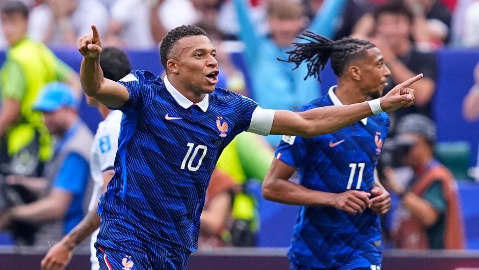 France's Kylian Mbappe (10) celebrates after scoring his team's first goal during the World Cup Group I soccer match between France and Iraq in Philadelphia, Monday, June 22, 2026. (AP Photo/Petr David Josek)