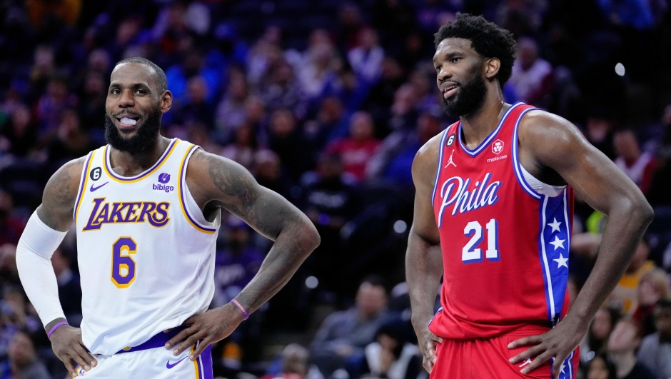 Los Angeles Lakers' LeBron James and Philadelphia 76ers' Joel Embiid play during an NBA basketball game, Friday, Dec. 9, 2022, in Philadelphia. (AP Photo/Matt Slocum, File)