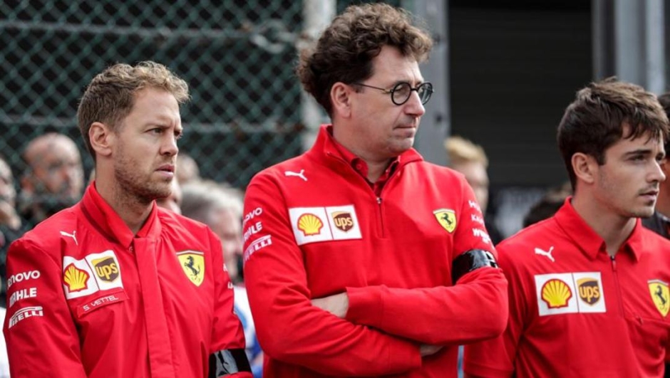 Sebastian Vettel, Mattia Binotto e Charles Leclerc. Afp