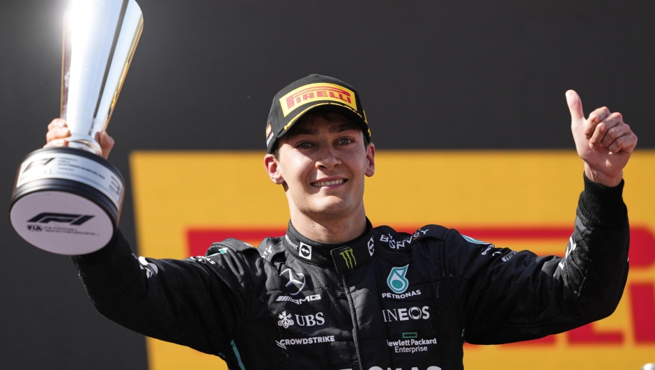 epa09966440 Third placed British George Russell of Mercedes celebrates on the podium after the Formula One Grand Prix of Spain held at Circuit Barcelona-Catalunya in Montmelo, Barcelona, Spain, 22 May 2022.  EPA/Alejandro Garcia