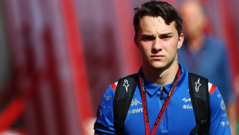 BARCELONA, SPAIN - MAY 20: Oscar Piastri of Australia, Alpine F1 Reserve Driver walks in the Paddock prior to practice ahead of the F1 Grand Prix of Spain at Circuit de Barcelona-Catalunya on May 20, 2022 in Barcelona, Spain. (Photo by Mark Thompson/Getty Images)