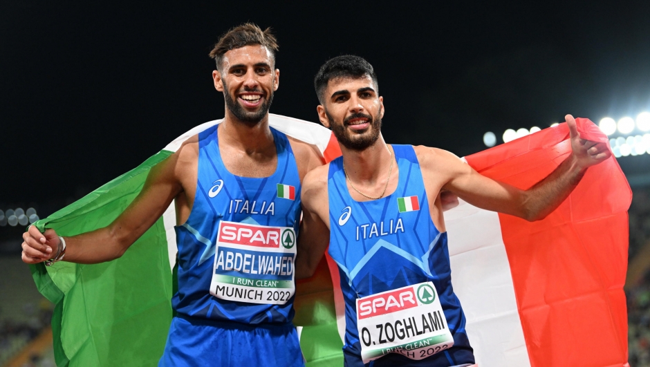epa10129645 Ahmed Abdelwahed (L) and Osama Zoghlami of Italy celebrate after placing second and third respectively in the menâ??s 3000 meters Steeplechase final during the Athletics events at the European Championships Munich 2022, Munich, Germany, 19 August 2022.  EPA/FILIP SINGER