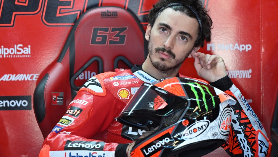 Ducati Italian rider Francesco Bagnaia sits in the box during the first MotoGP free practice session ahead of the Moto Grand Prix of Aragon at the Motorland circuit in Alcaniz on September 16, 2022. (Photo by PIERRE-PHILIPPE MARCOU / AFP)
