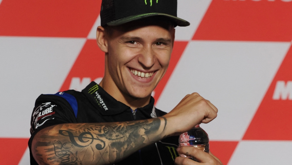 Monster Energy Yamaha MotoGP rider Fabio Quartararo of France smiles during a pre-event press conference at the MotoGP Japanese Grand Prix in the Twin Ring Motegi circuit in Motegi, Tochigi prefecture on September 22, 2022. (Photo by Toshifumi KITAMURA / AFP)