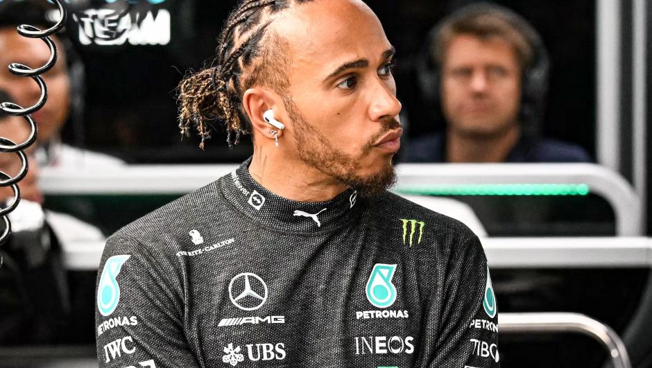Mercedes' British driver Lewis Hamilton looks on before a practice session for the Formula One Singapore Grand Prix night race at the Marina Bay Street Circuit in Singapore on October 1, 2022. (Photo by MOHD RASFAN / AFP)