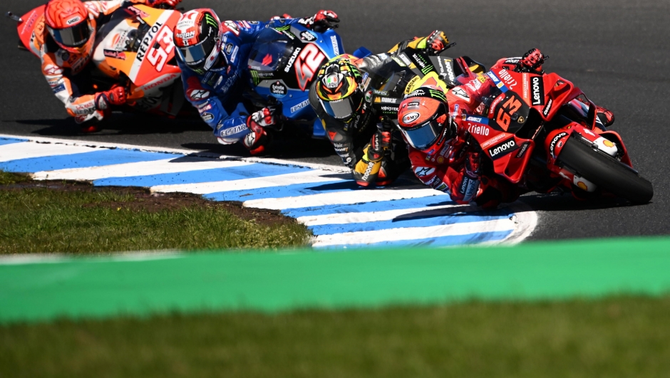 epa10246638 Francesco Bagnaia of Italy (front) riding for Ducati Team leads the field during the MotoGP race at the Australian Motorcycle Grand Prix at the Phillip Island Grand Prix Circuit on Phillip Island, Victoria, Australia, 16 October 2022.  EPA/JOEL CARRETT AUSTRALIA AND NEW ZEALAND OUT