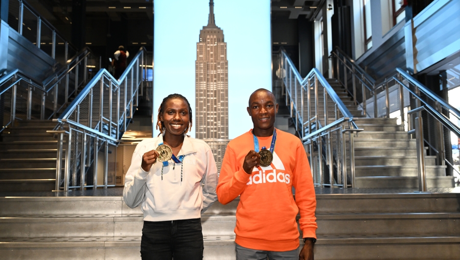 November 7, 2022: The 2022 TCS NYC Marathon Champions pose for photos at the Empire State Building in New York, NY. (Photo by Jon Simon for NYRR)