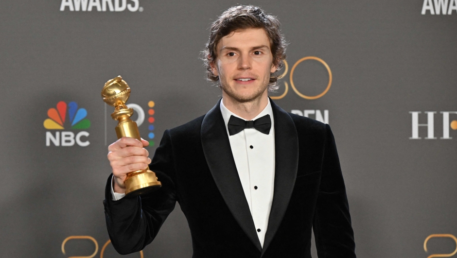 US actor Evan Peters poses with the award for Best Actor - Limited Series, Anthology Series or Television Motion Picture for "Dahmer - Monster: The Jeffrey Dahmer Story" in the press room during the 80th annual Golden Globe Awards at The Beverly Hilton hotel in Beverly Hills, California, on January 10, 2023. (Photo by Frederic J. Brown / AFP)