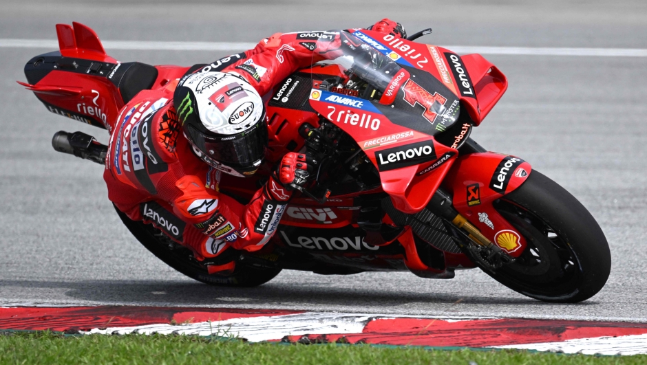 Ducati Lenovo Team's Italian rider Francesco Bagnaia takes a corner during the first day of the pre-season MotoGP winter test at the Sepang International Circuit in Sepang on February 10, 2023. (Photo by Mohd RASFAN / AFP)