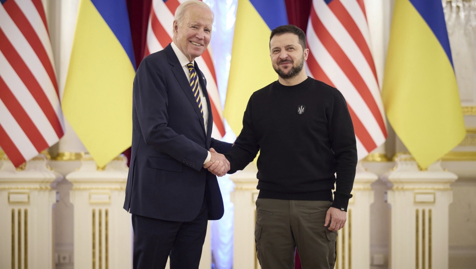 In this image from video provided by the Ukrainian Presidential Press Office and posted on Facebook, on Monday, Feb. 20, 2023, Ukrainian President Volodymyr Zelenskyy, right, and U.S. President Joe Biden shake hands during their meeting in Kyiv, Ukraine. (Ukrainian Presidential Press Office via AP)