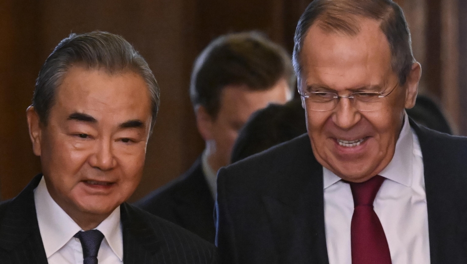 epa10483106 Russian Foreign Minister Sergei Lavrov (R) and China's Director of the Office of the Central Foreign Affairs Commission Wang Yi (L) enter a hall during a meeting in Moscow, Russia, 22 February 2023. Wang Yi arrived in Moscow on 21 February, and engaged in negotiations with the Secretary of the Security Council of the Russian Federation Nikolai Patrushev. At this meeting, Wang Yi stressed that Chinese-Russian relations are 'strong as a rock' and 'will stand the test in the changing international situation.' According to Wang Yi, Beijing is ready, together with Moscow, to resolutely defend national interests and promote mutually beneficial cooperation in all areas.  EPA/ALEXANDER NEMENOV / POOL