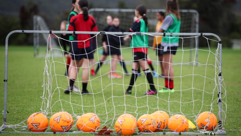 AUCKLAND, NEW ZEALAND - JUNE 18: Training the the rain for the Warkworth Football Club's 13th grade girls Phoenix team at Shoesmith Domain, Warkworth on June 18, 2020 in Auckland, New Zealand. Community sport has resumed across New Zealand following the lifting of COVID-19 restrictions. New Zealand moved to COVID-19 Alert Level 1 on Tuesday 9 June. While life is able to mostly return to normal under Alert Level 1, strict border measures will remain with mandatory 14 day isolation and quarantine for any overseas arrivals. (Photo by Fiona Goodall/Getty Images)