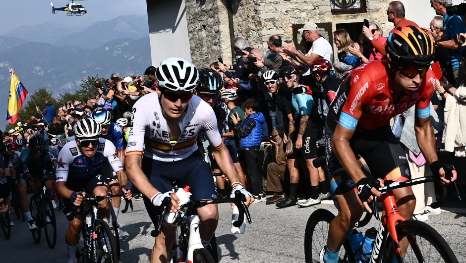 CORRECTION / Team Movistar rider Spain's Mikel Landa (R) rides past the Madonna del Ghisallo church during the 116th edition of the Giro di Lombardia (Tour of Lombardy), a 252,42 km cycling race from Bergamo to Como on October 8, 2022. (Photo by Marco BERTORELLO / AFP) / The erroneous mention[s] appearing in the metadata of this photo by Marco BERTORELLO has been modified in AFP systems in the following manner: [Team Bahrain Victorious' Spanish rider Mikel Landa ] instead of [Team Movistar' Spanish rider Mikel Landa ]. Please immediately remove the erroneous mention[s] from all your online services and delete it (them) from your servers. If you have been authorized by AFP to distribute it (them) to third parties, please ensure that the same actions are carried out by them. Failure to promptly comply with these instructions will entail liability on your part for any continued or post notification usage. Therefore we thank you very much for all your attention and prompt action. We are sorry for the inconvenience this notification may cause and remain at your disposal for any further information you may require.