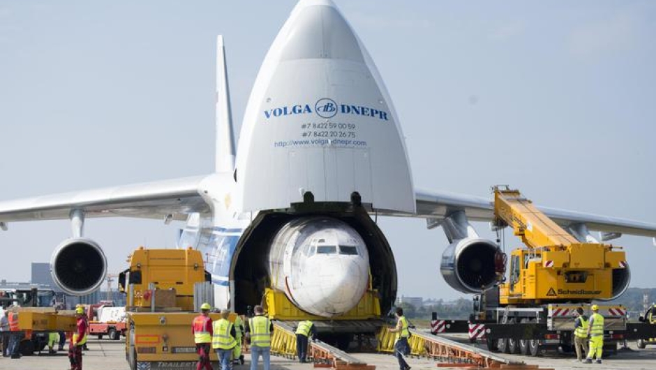 epaselect epa06221328 The fuselage of the Boeing 737-200 that once flew for German carrier Lufthansa under the name 'Landshut' is unloaded from the cargo bay of an Antonov AN 124 plane in Friedrichshafen, Germany, 23 September 2017. The 'Landshut' in 1977 was kidnapped by Palestinian terrorists, hijacked to Mogadishu where members of the GSG-9 special forces of the German Federal police on 18 October 1977 stormed the aircraft and freed the hostages. The plane will be part of activities commemorating the events of the so-called 'German Autumn', a series of terrorist attacks and kidnappings of the Red Army Faction (RAF) insurgent group and the German authorities' fight against the terrorism. The old discharged plane was found earlier this year in Fortaleza, Brazil, where it recently was dismantled to be brought back to Germany.  EPA/STEFFEN SCHMIDT